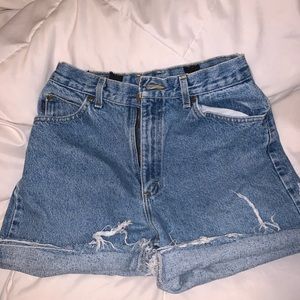 Distressed denim cutoff shorts